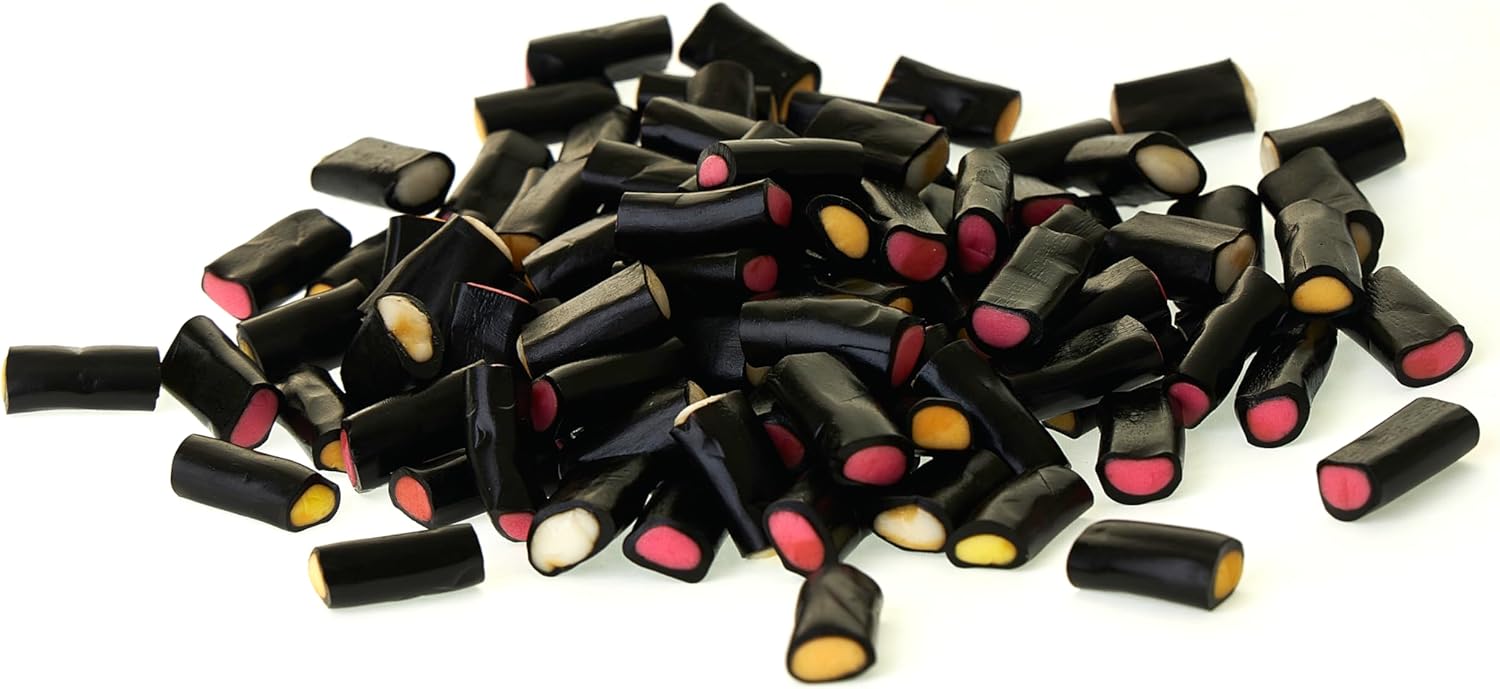 Pile of black cream licorice pieces