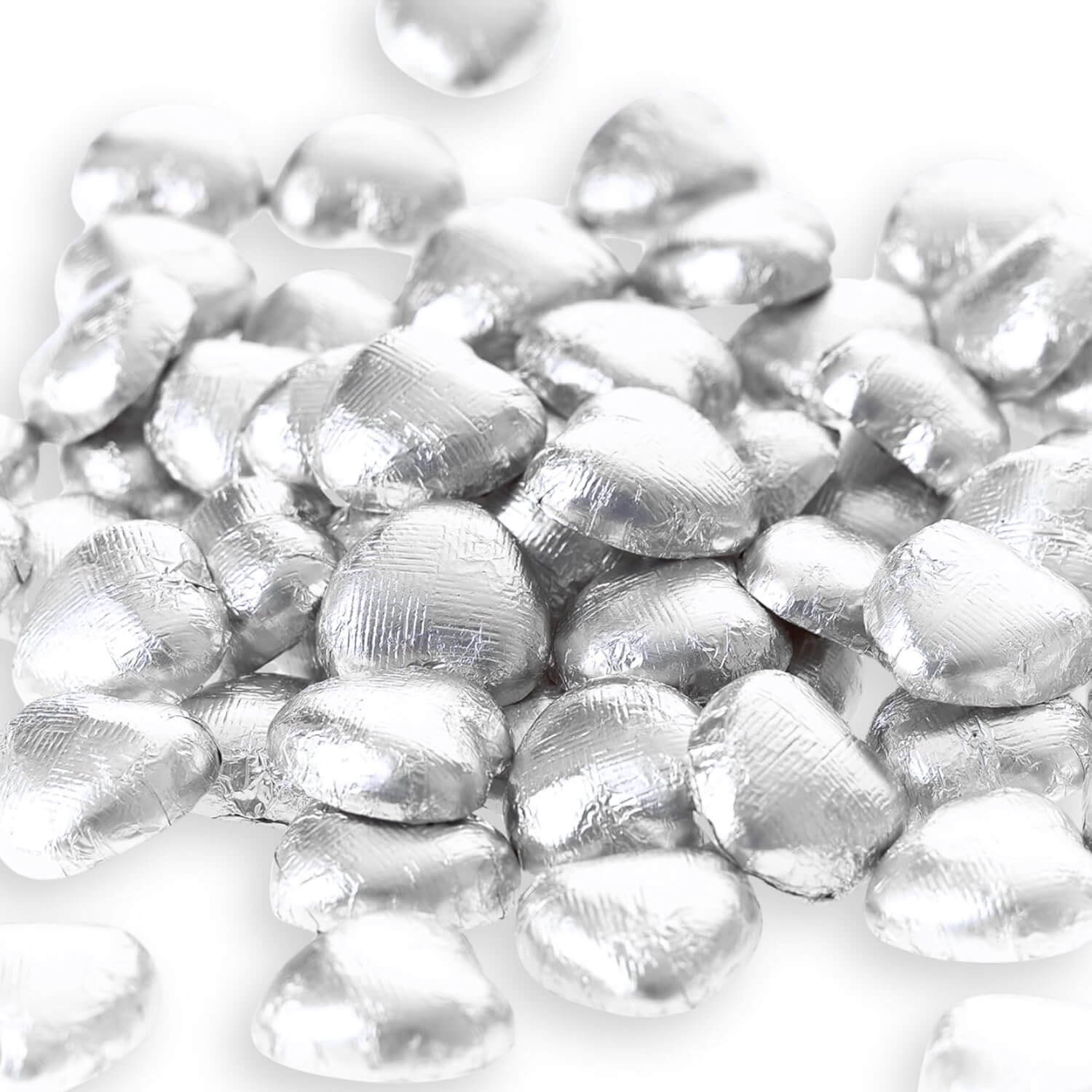 Silver heart-shaped chocolate candies on a white background
