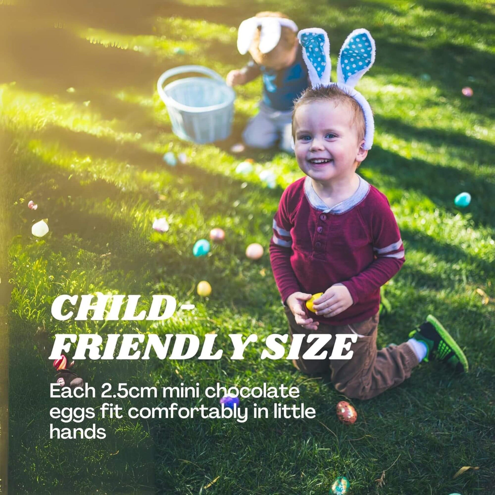 Child wearing bunny ears in a grassy area with Easter eggs, promoting child-friendly chocolate eggs.
