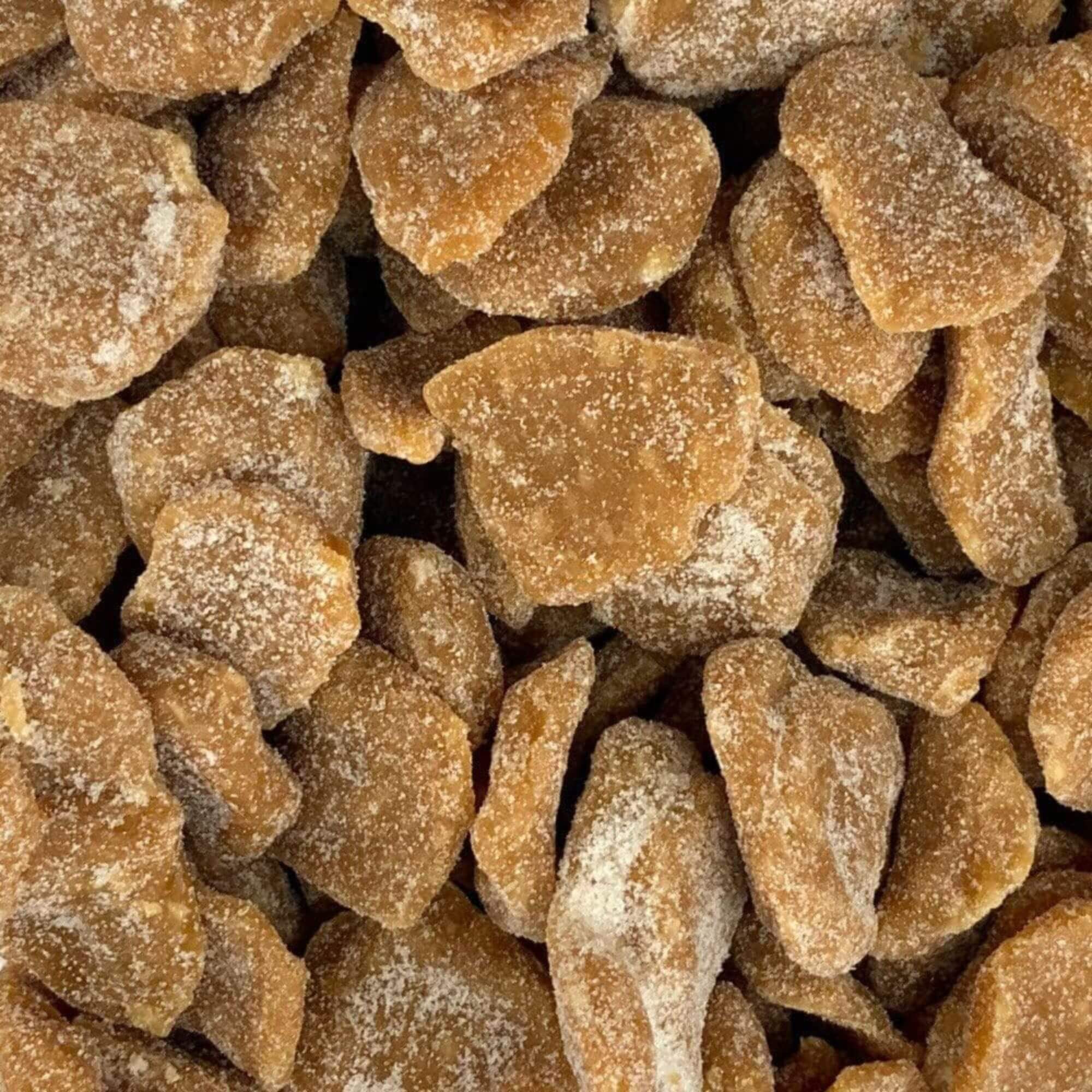 Close-up of brown candy pieces with a sugary coating