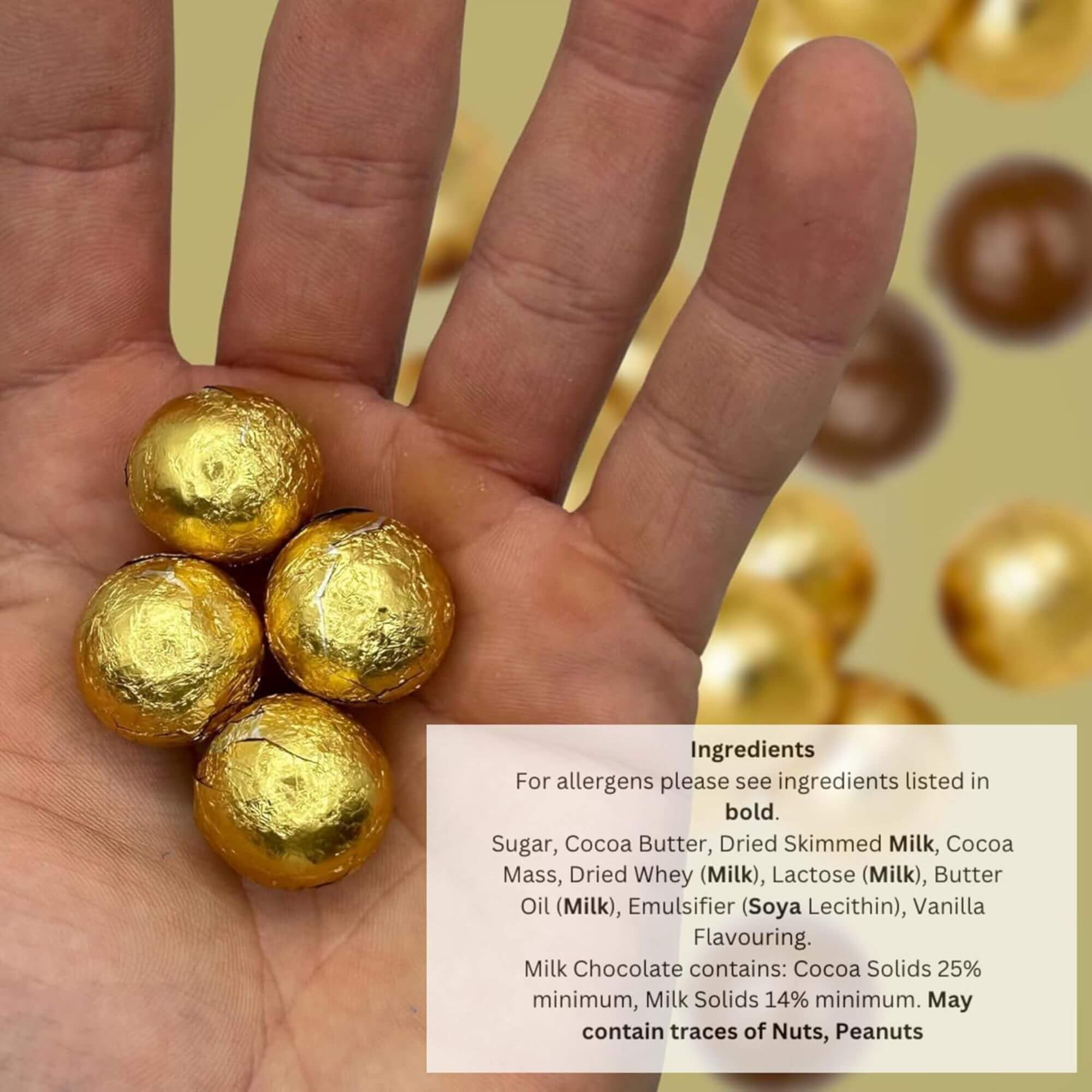 Hand holding gold-wrapped chocolate balls with an ingredient label on a yellow background