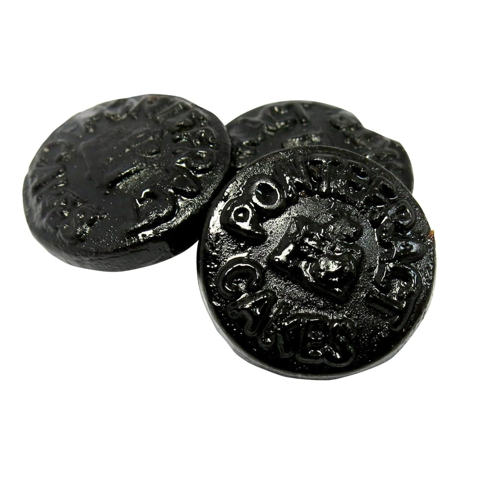 Three black Pontefract Cakes