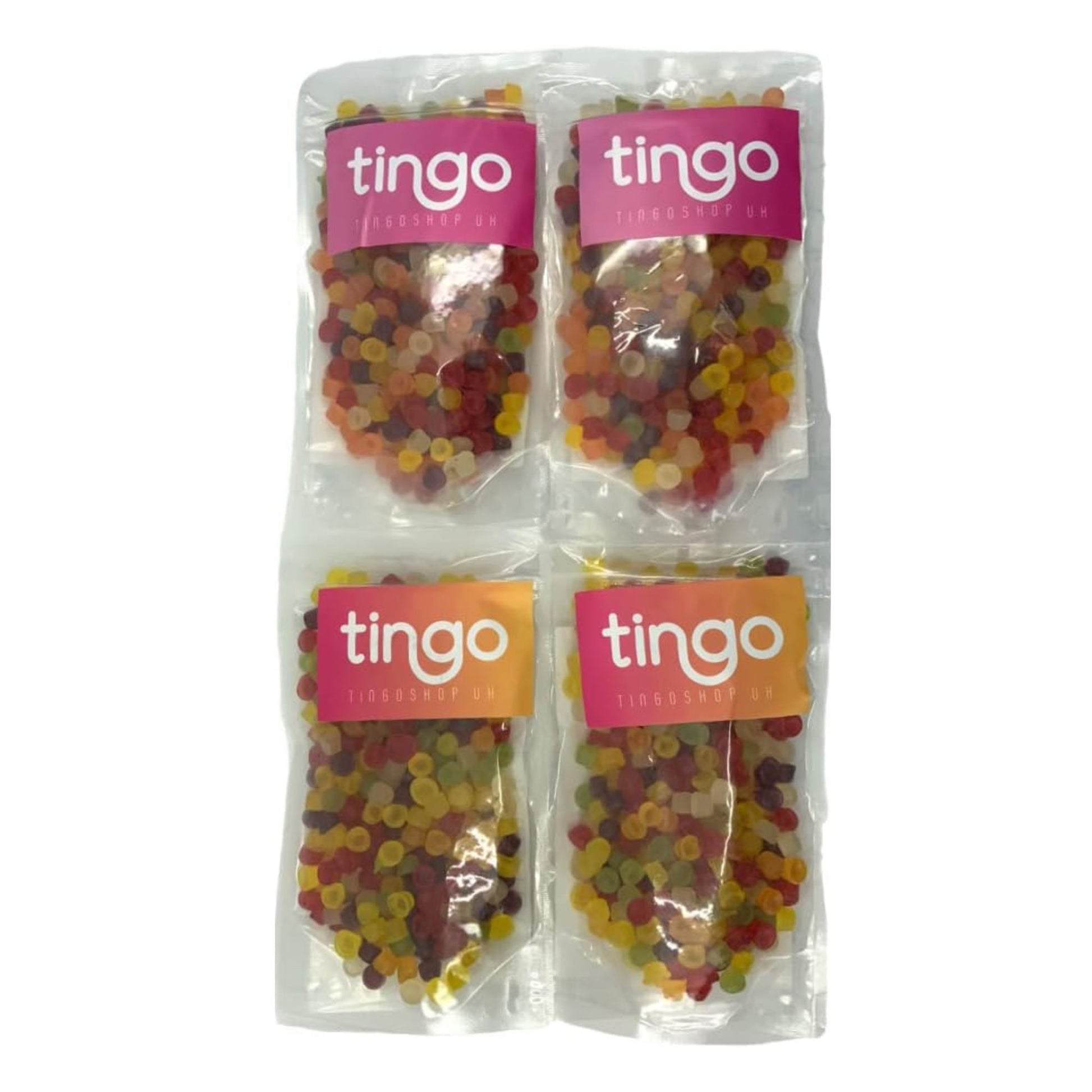Four packages of tingo gummy bears on a white background