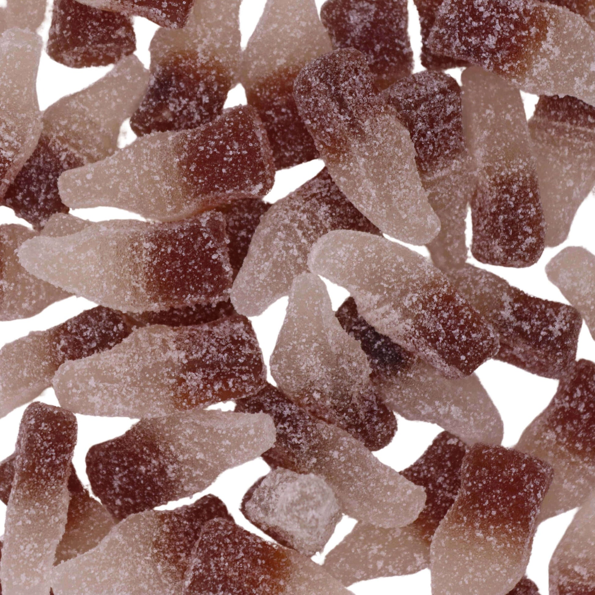 Close-up of brown gummy bears on a white background