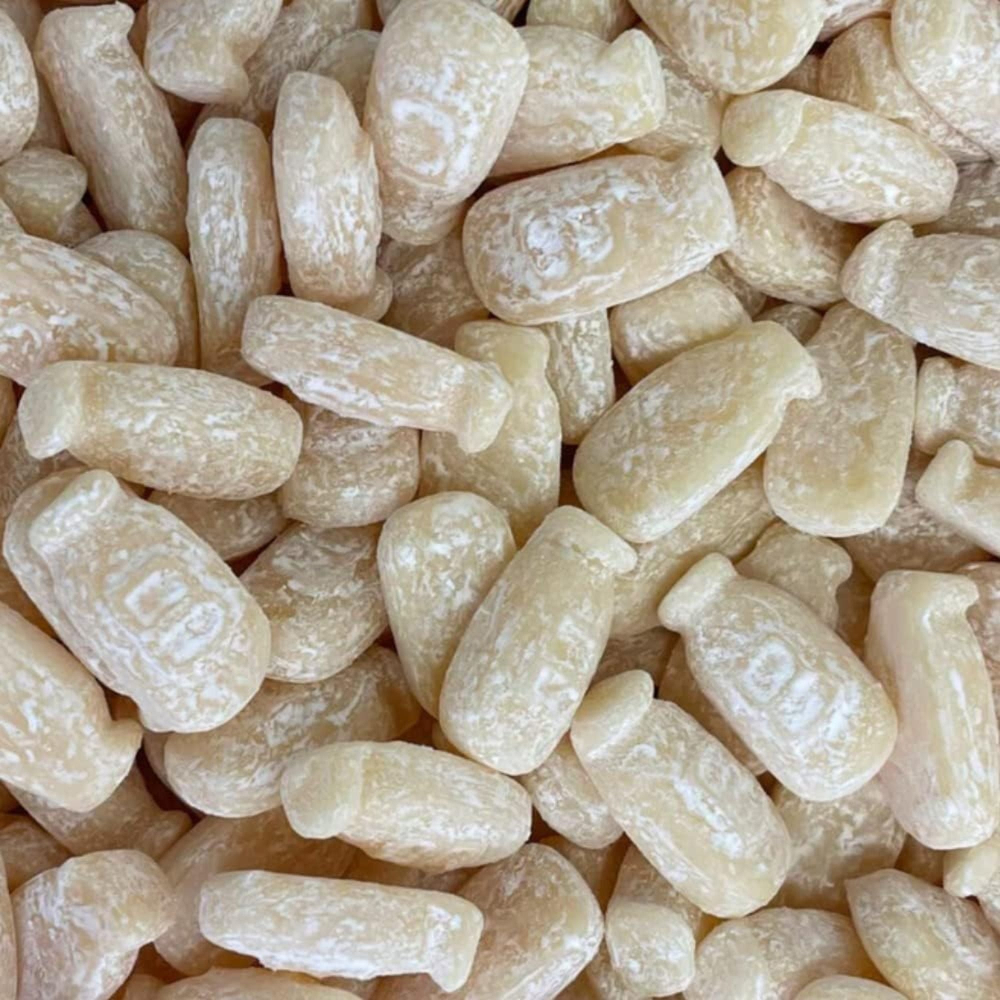 Dusted Milk Bottles – 1kg Bag by Manchester Confectionery